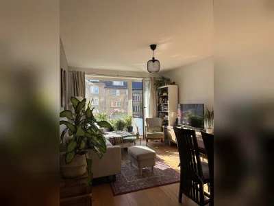 Helle 2-Zimmer-Oase mit Dielenboden, Balkon & Gartenzugang